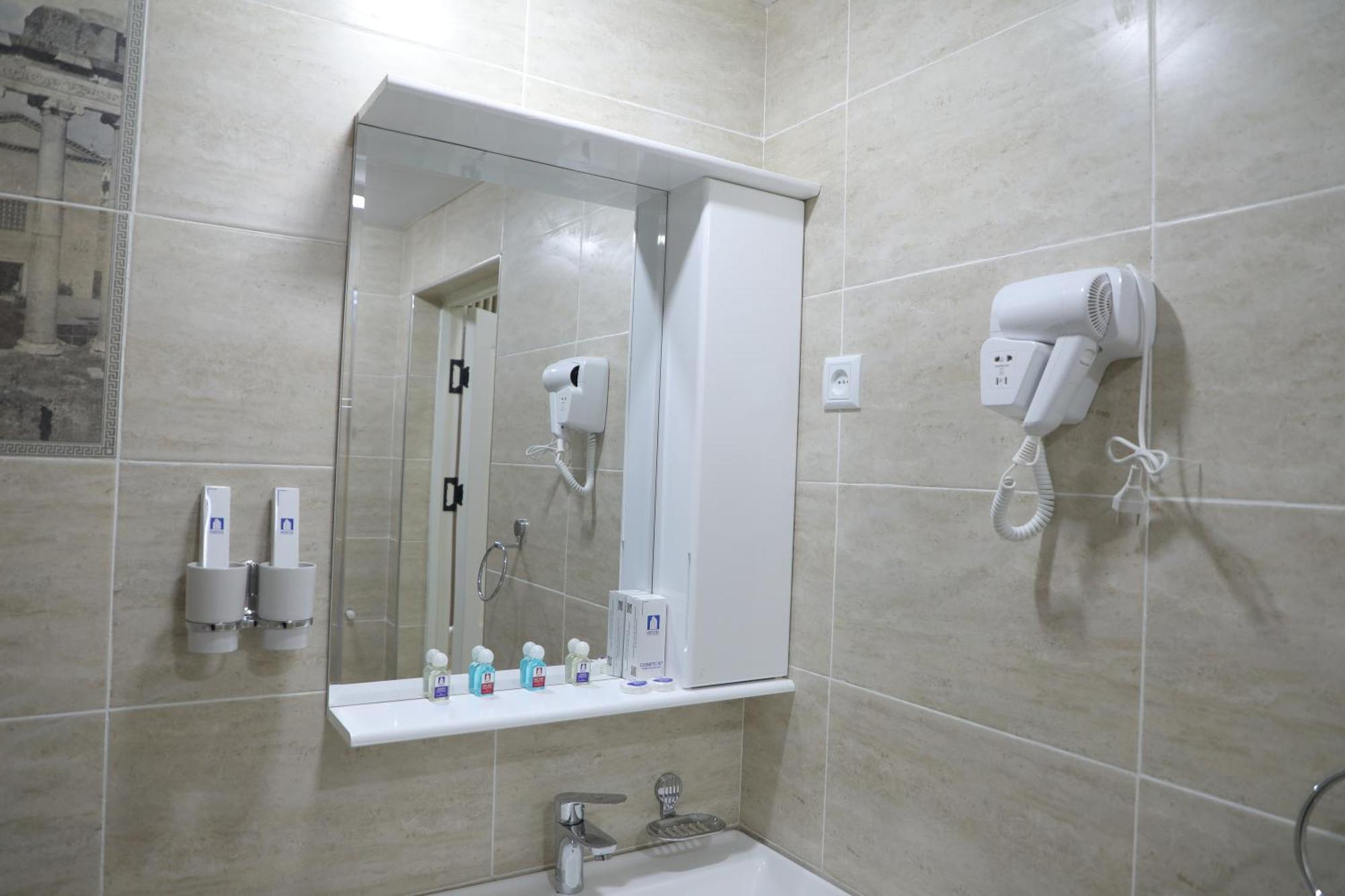 Status Hotel Karshi Extérieur photo