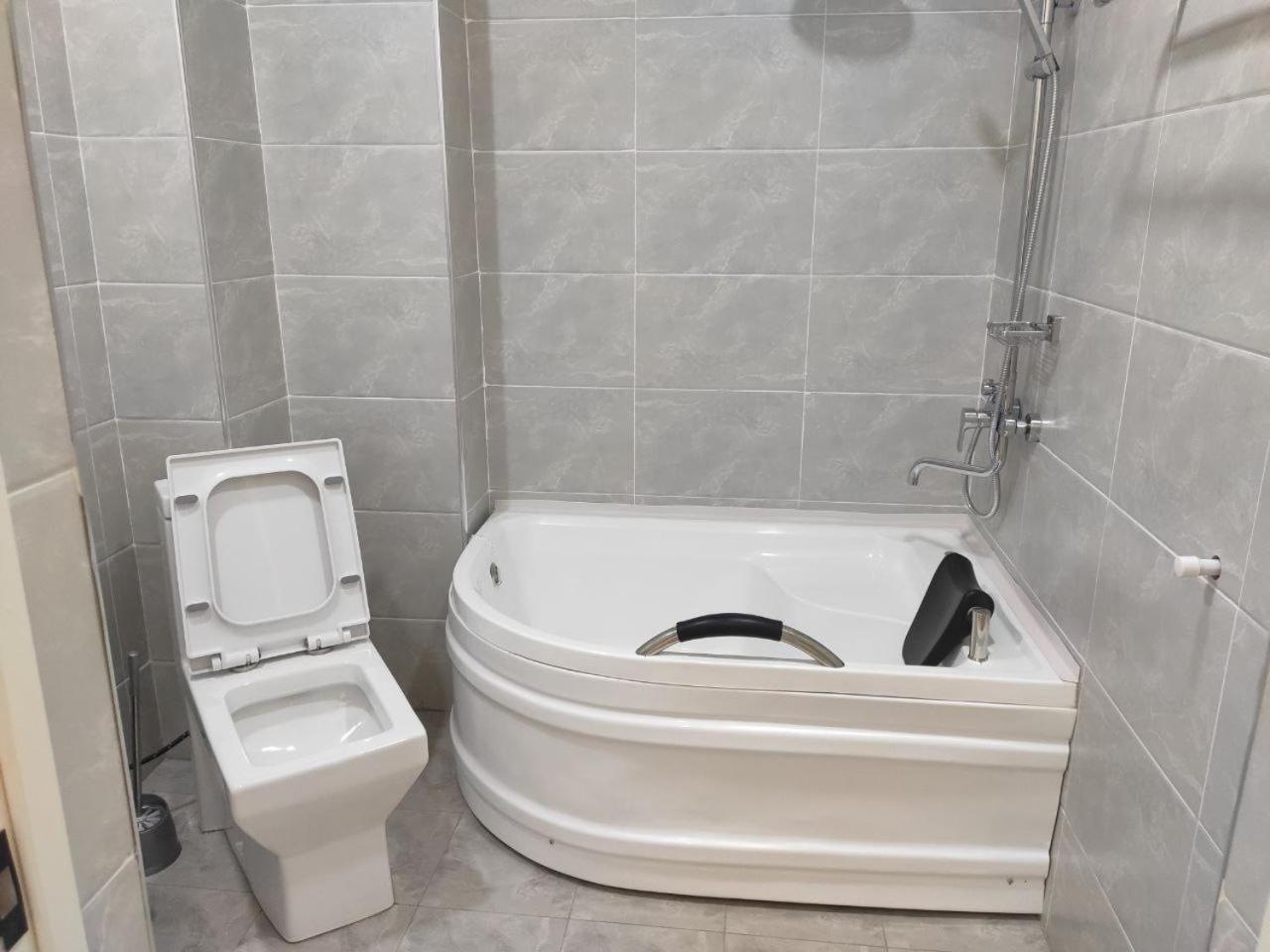 Status Hotel Karshi Extérieur photo
