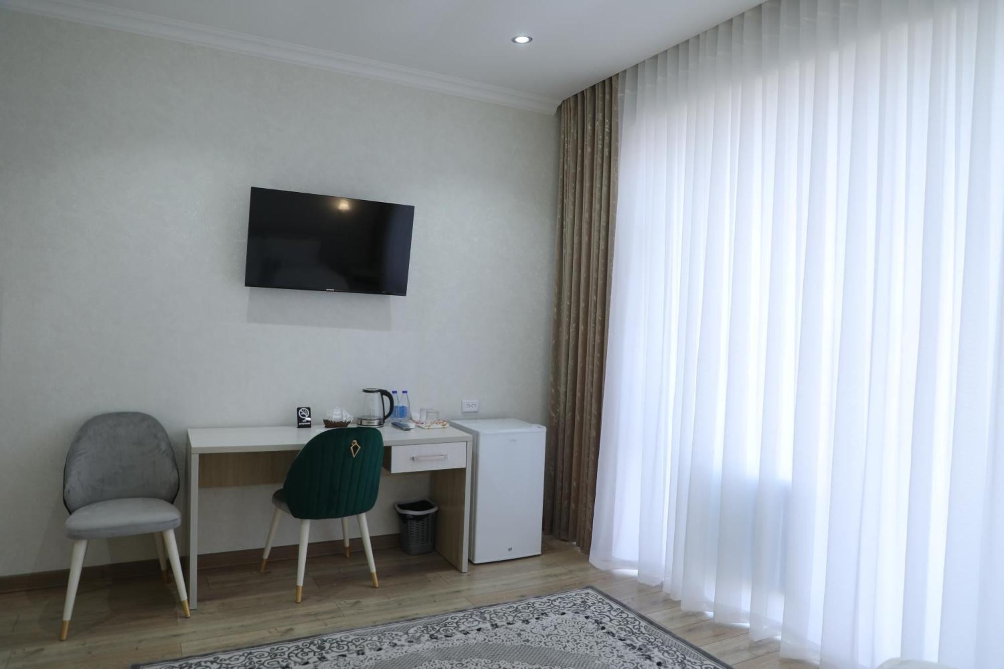 Status Hotel Karshi Extérieur photo